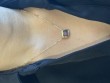 Garnet Emerald Cut Bezel Pendant In 18K Yellow Gold.