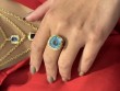 Blue Topaz Cushion Ring In 18K Yellow Gold.